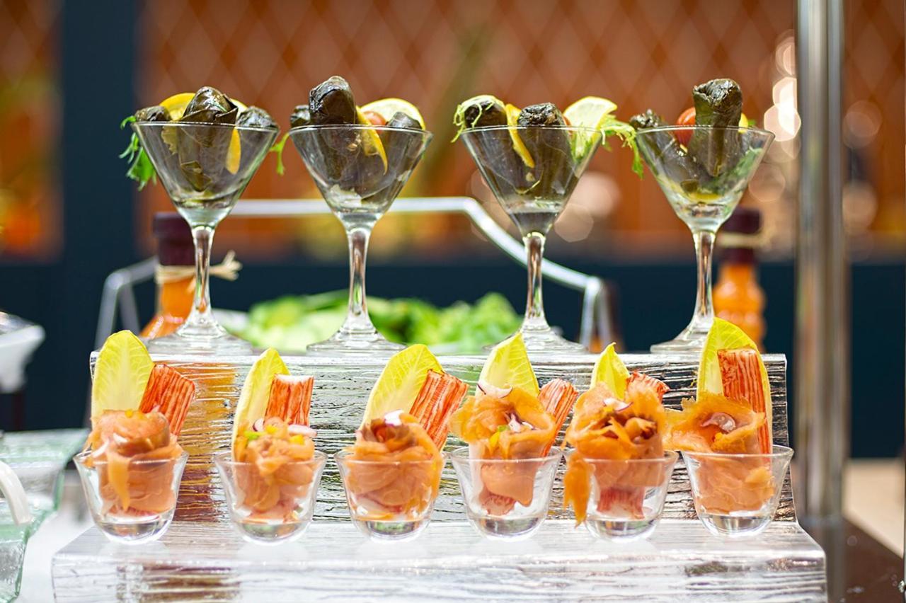 Holiday Suites Al Azizia Mecca Exterior photo Apéritif at a buffet